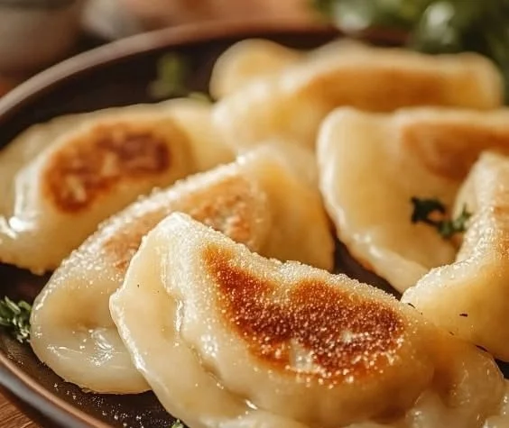 Delicious homemade gluten free perogies served with toppings